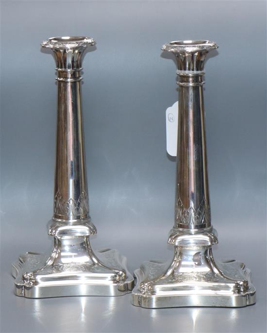 A pair of 19th century Dutch engraved white metal candlesticks, by Bennewitz, 23.4cm.